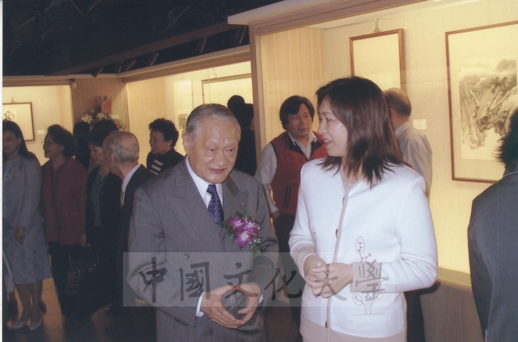 2003年4月11日台灣創價學會舉辦「盡攜書畫到天涯─歐豪年作品展」開幕剪綵的圖檔，第52張，共66張